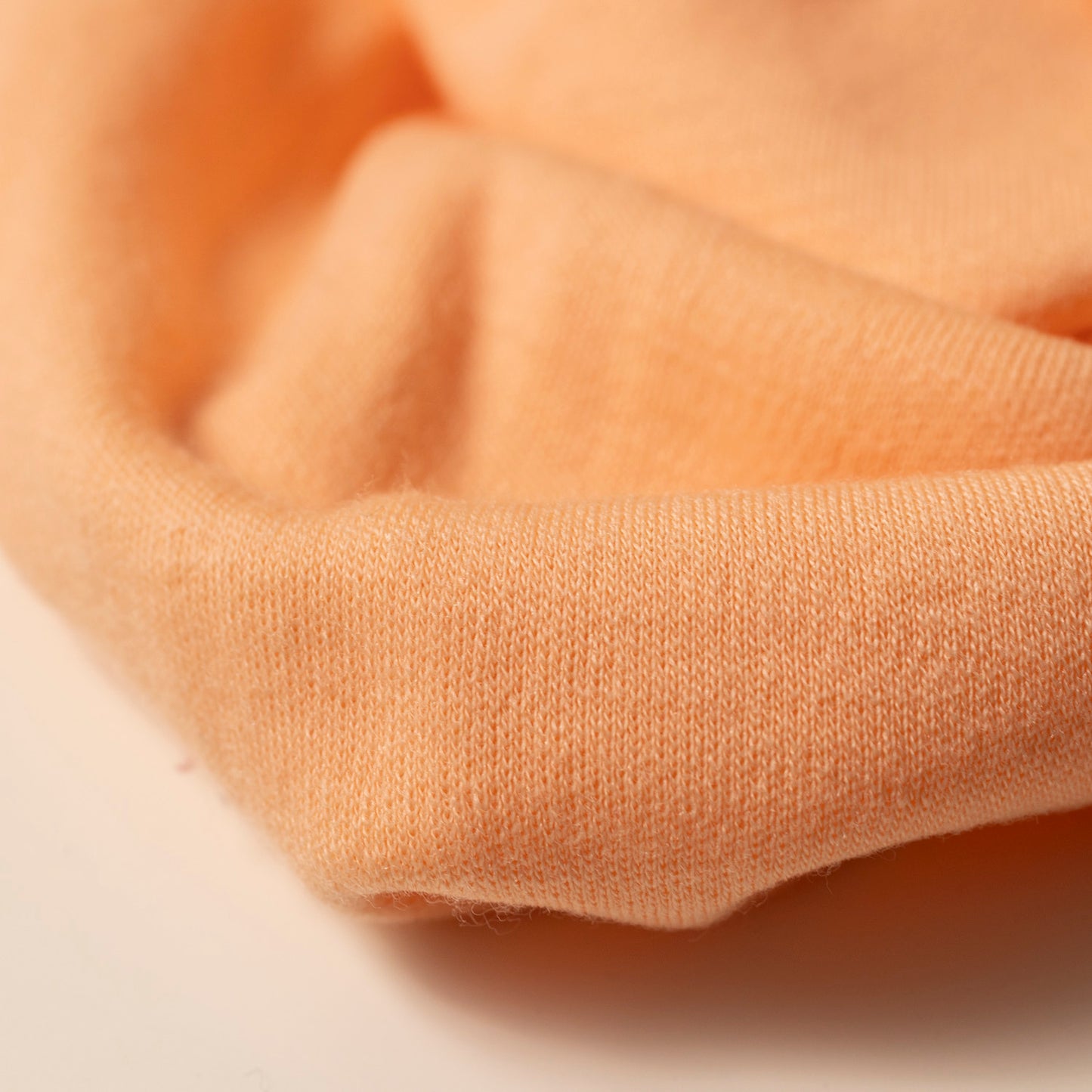 100% MERINO INTERLOCK 38 BRZOSKWINIA